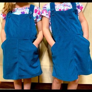 Cute turquoise overalls with cute shirt to match!